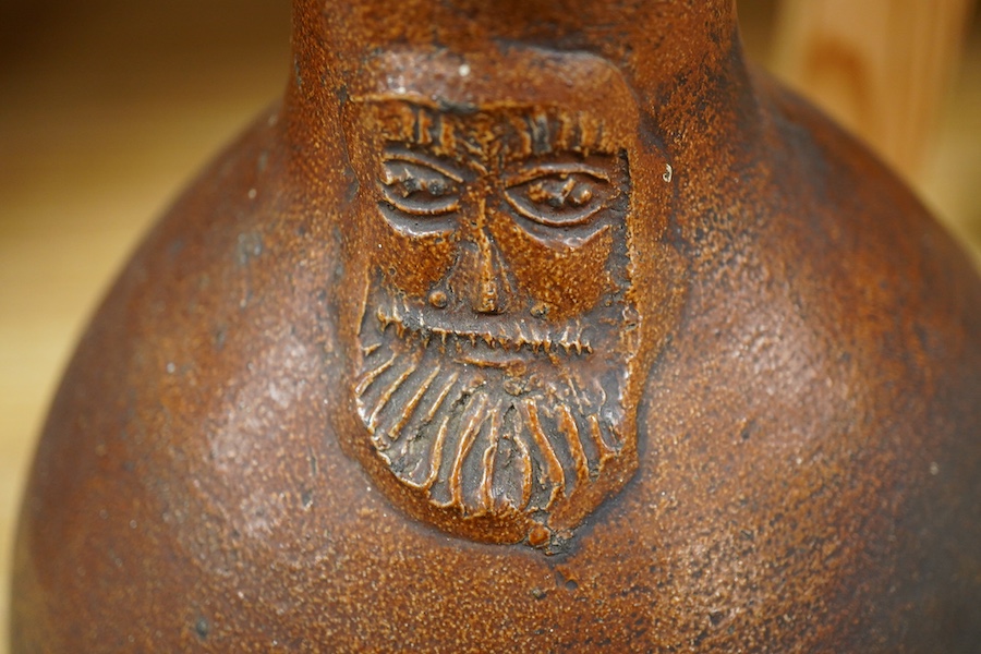 A Bellarmine stoneware jug, 17th century, 36cm high